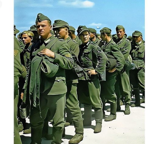1944年,诺曼底登陆大批德国士兵被俘的照片,看起来精气神十足