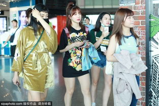组图火箭少女退团风波后现身机场成员面无表情似未受影响