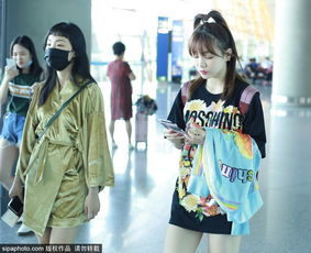 组图火箭少女退团风波后现身机场成员面无表情似未受影响